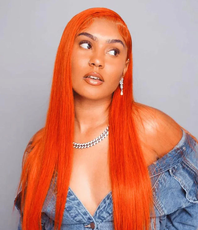 Vibrant orange human hair wig with sleek straight style, perfect for bold fashion looks and natural styling.