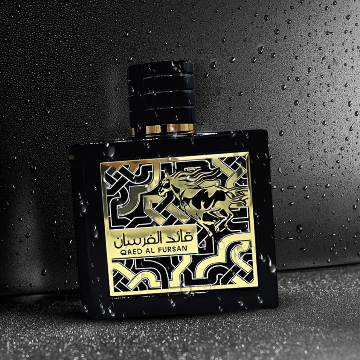 Luxury black perfume bottle with gold horse design, Qaed Al Fursan, on wet dark surface