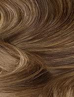 Luxury human hair wig with natural waves and rich brown tones for effortless styling