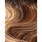 Luxury human hair wig with natural waves and warm brown highlights for effortless styling
