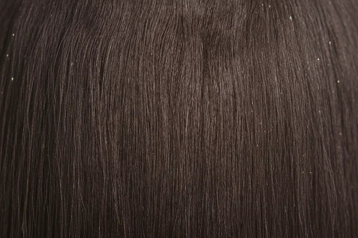 Two packages of Outre Premium Purple Pack Yaki hair extensions, showcasing the product as 100% human hair with a straight texture.