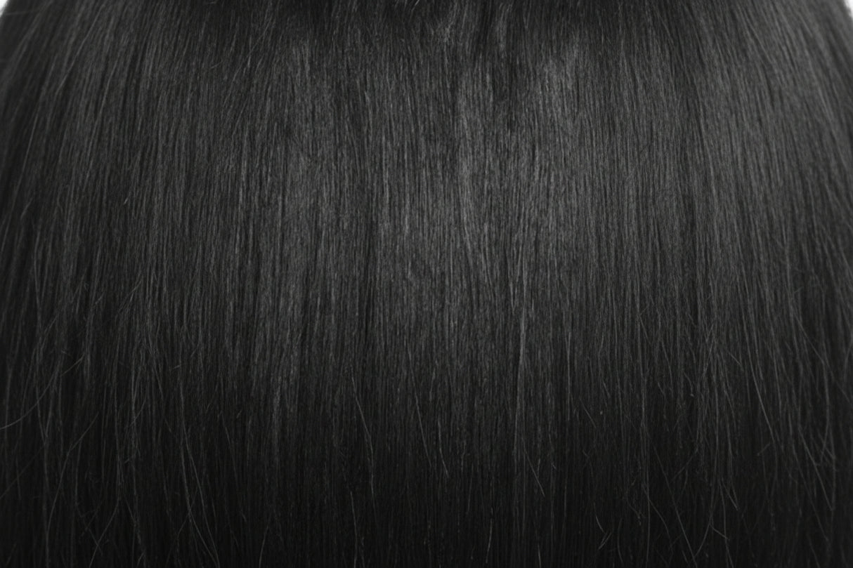 Two packages of Outre Premium Purple Pack Yaki hair extensions, showcasing the product as 100% human hair with a straight texture.