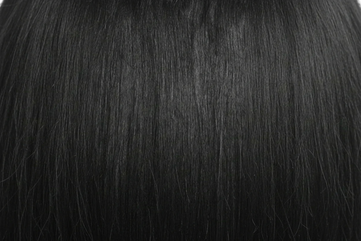 Two packages of Outre Premium Purple Pack Yaki hair extensions, showcasing the product as 100% human hair with a straight texture.