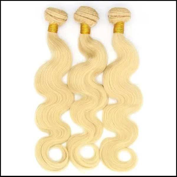 Blonde body wave human hair bundles with gold bands, ideal for natural styling and extensions