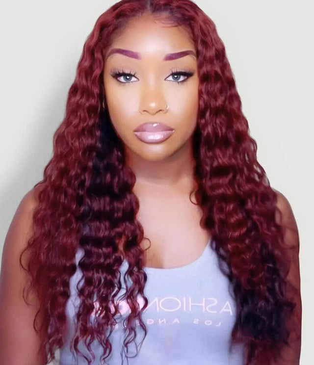 Deep red curly human hair wig with natural waves and lace front styling