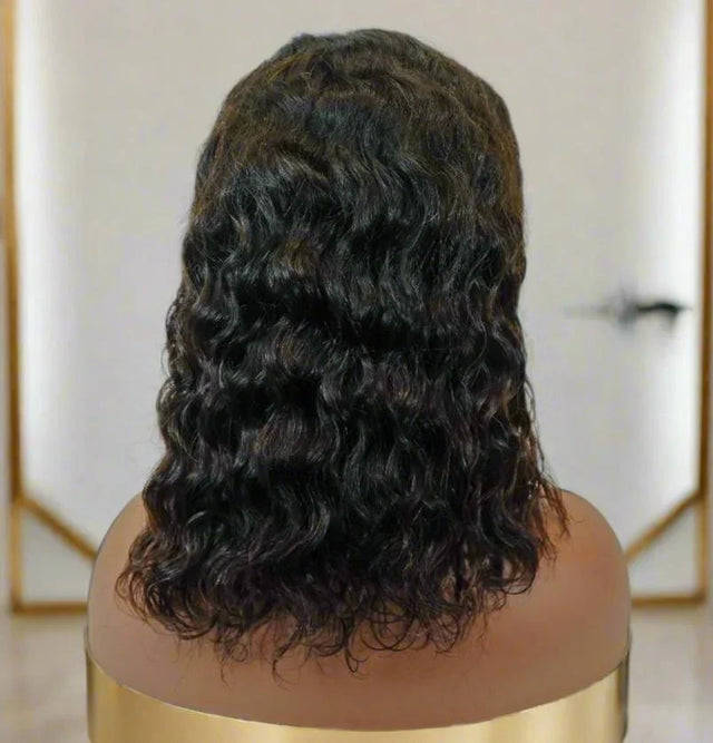 Deep wave human hair wig on mannequin, natural curls, premium quality styling