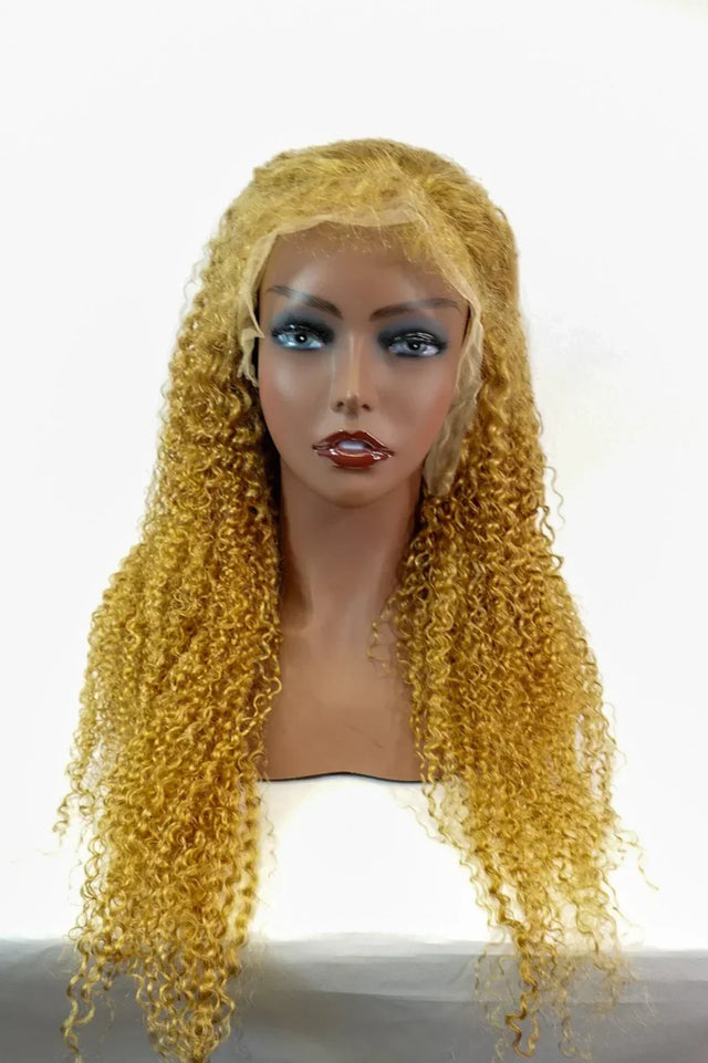 Golden curly human hair wig on mannequin, natural lace front for realistic styling