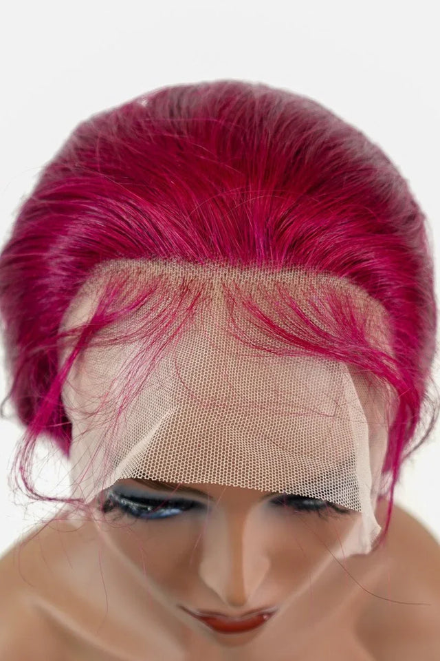 Vibrant pink human hair lace front wig on mannequin, showcasing natural-looking hairline and premium texture