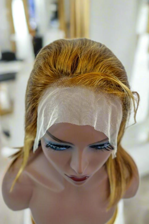 Human hair lace front wig with natural-looking hairline on mannequin head