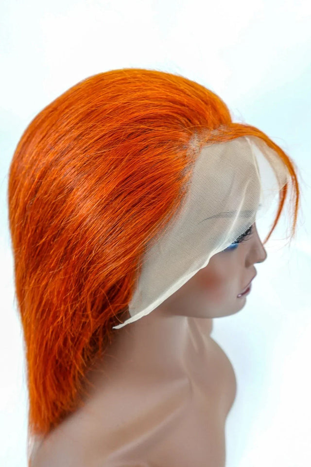 Vibrant orange human hair lace front wig on mannequin, natural styling ready