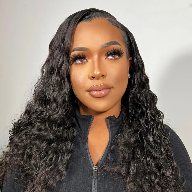 Woman wearing a natural-looking human hair wig with deep waves, styled for everyday elegance.