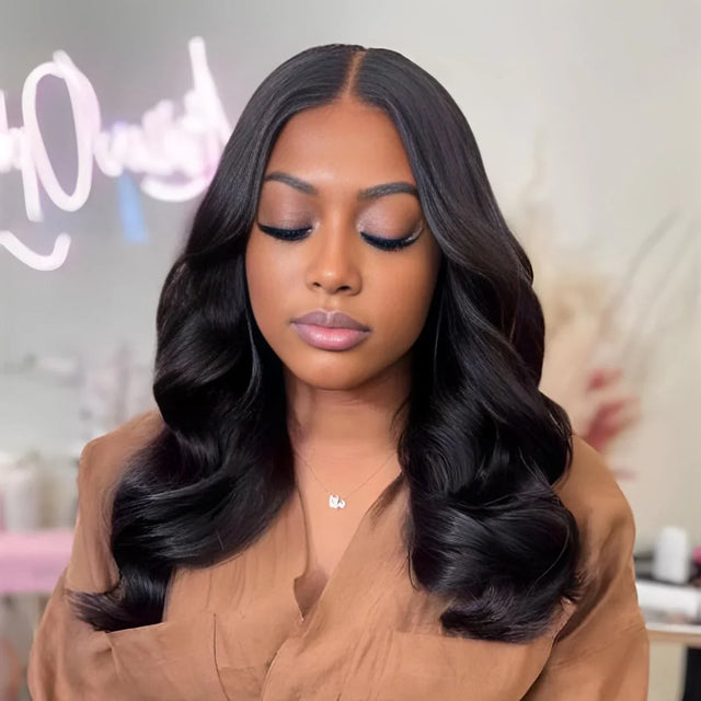 Woman wearing a natural-looking human hair wig with loose waves, styled for everyday elegance.