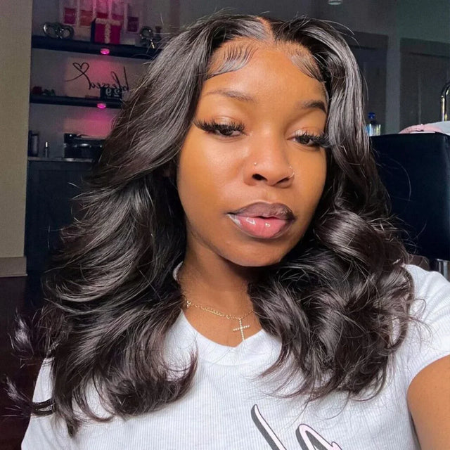 Woman wearing natural-looking human hair wig with body waves and lace front