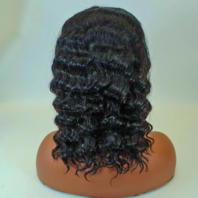 Deep wave human hair wig on mannequin head, natural styling for everyday wear