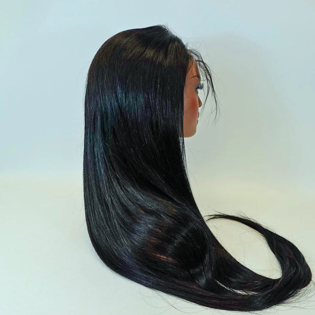 Long straight human hair wig with natural shine, sleek black strands on mannequin head