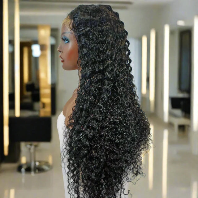 Long curly human hair wig on mannequin in salon setting, natural styling, premium quality