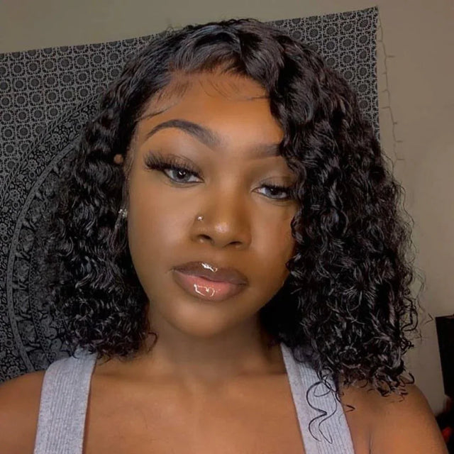 Woman wearing a natural curly human hair wig with lace front, styled for everyday wear.