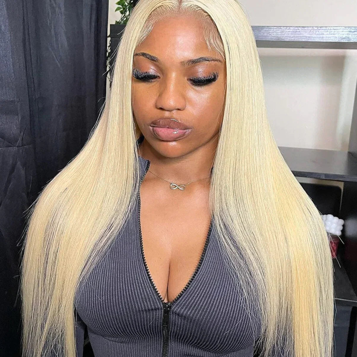 Long straight platinum blonde human hair wig with natural lace front, styled sleek for everyday wear