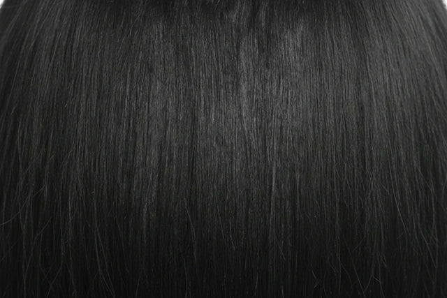 Two packages of Outre Premium Purple Pack Yaki hair extensions, showcasing the product as 100% human hair with a straight texture.