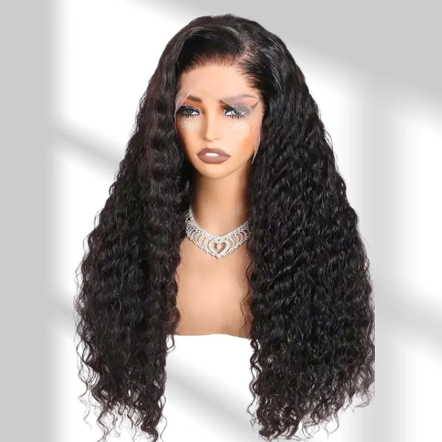Woman wearing a wig with long, wavy hair on a plain background