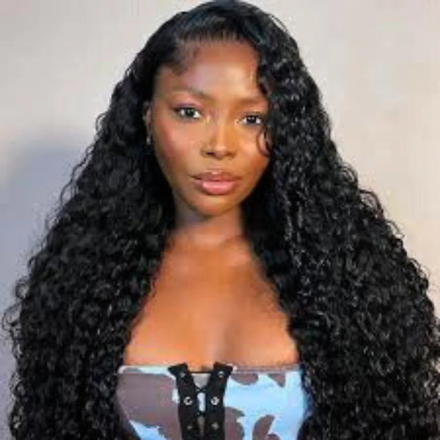 Woman wearing long, curly human hair wig with natural-looking lace front