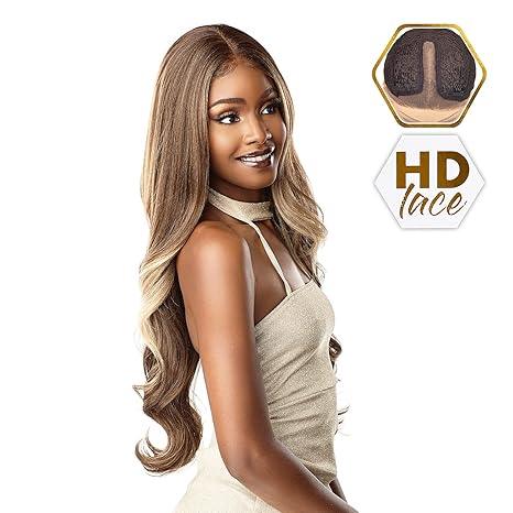 Woman wearing HD lace human hair wig with natural waves and seamless blend