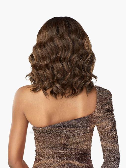 Back view of woman with wavy brown human hair wig, shoulder-length curls, stylish one-shoulder top