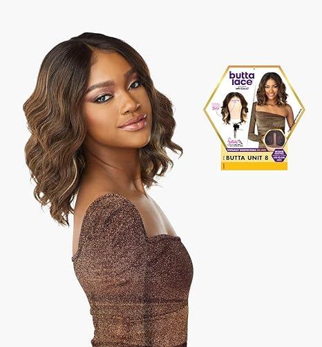 Woman wearing Butta Lace human hair wig with wavy brown curls, styled in a shoulder-length cut.