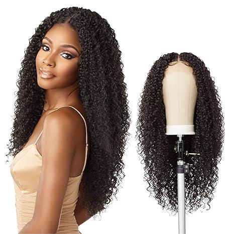 Black woman modeling long curly human hair wig with lace front, shown on mannequin for natural styling