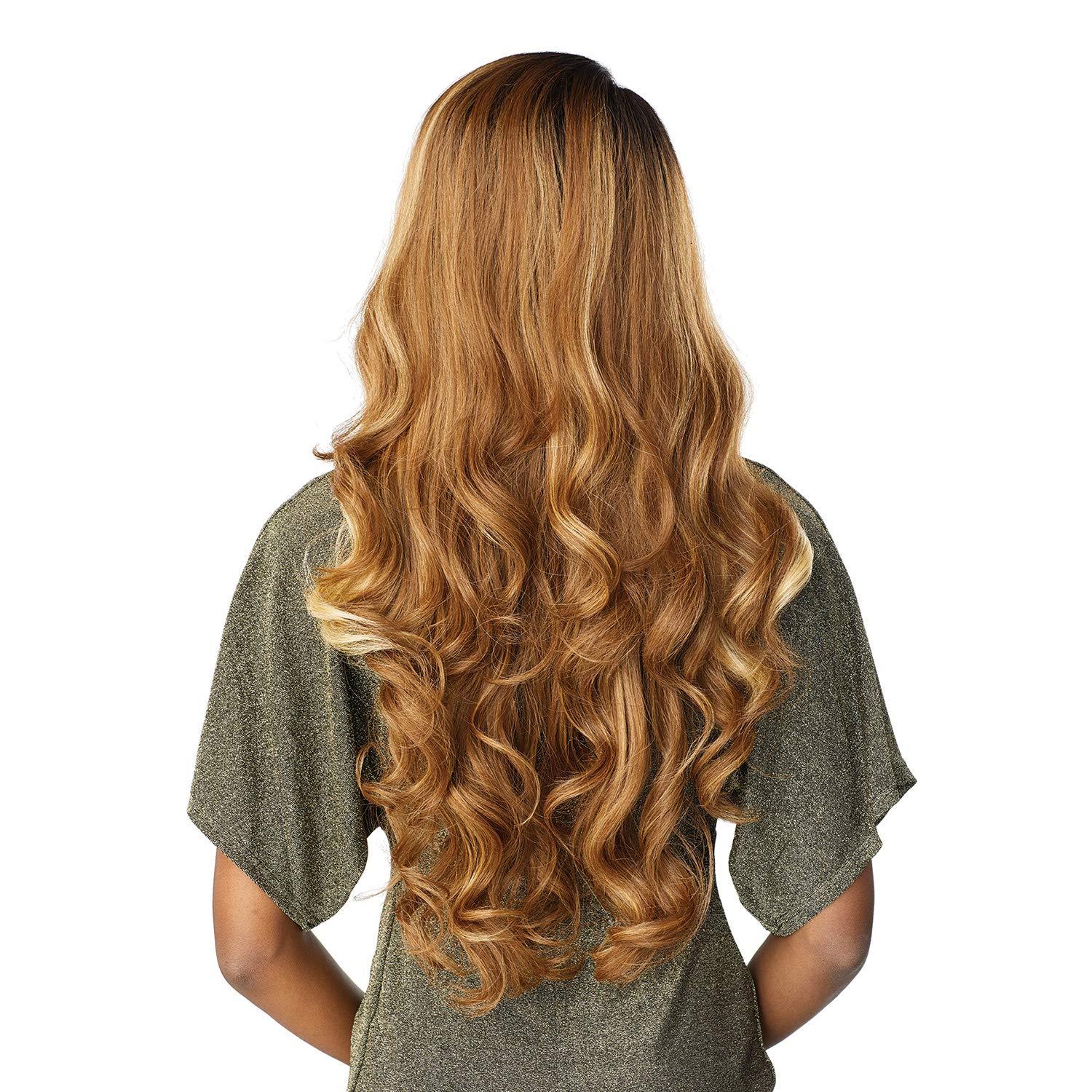 Long wavy human hair wig with caramel ombre highlights, natural voluminous curls for stylish look