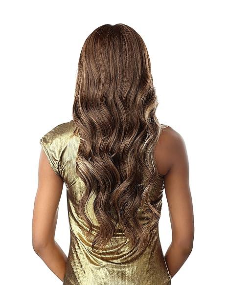 Long wavy human hair wig with ombre highlights, styled on model in gold top