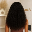 Luxury human hair wig with deep curls, natural volume, and sleek finish for effortless styling