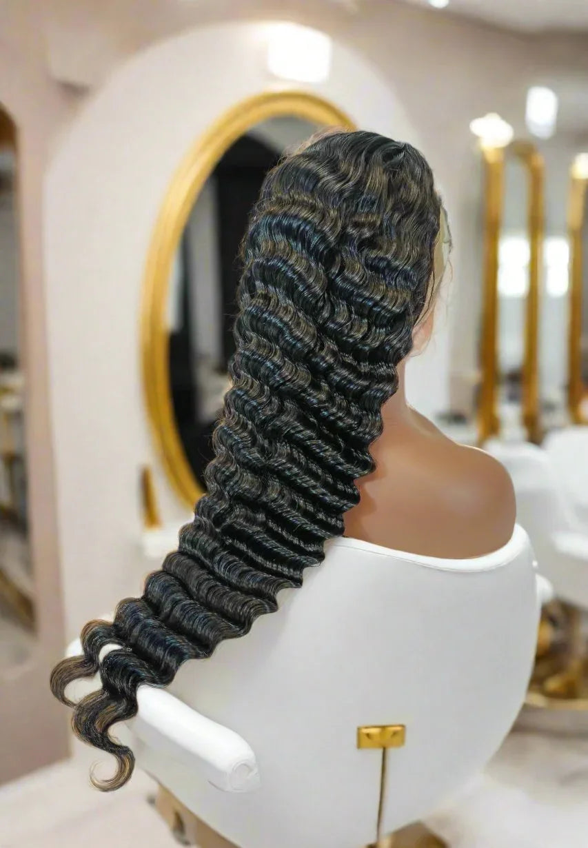 Deep wave human hair wig on mannequin in salon, natural styling with blue-black highlights