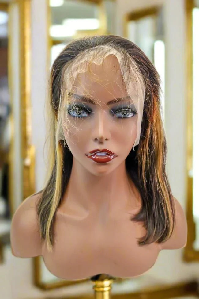 Human hair lace front wig with natural part, styled on mannequin head for realistic look