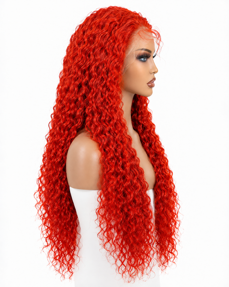 A bright red, voluminous curly wig displayed on a mannequin wearing Bohemian 15A Transparent 13x4 Full Frontal 180 Density Fire Red