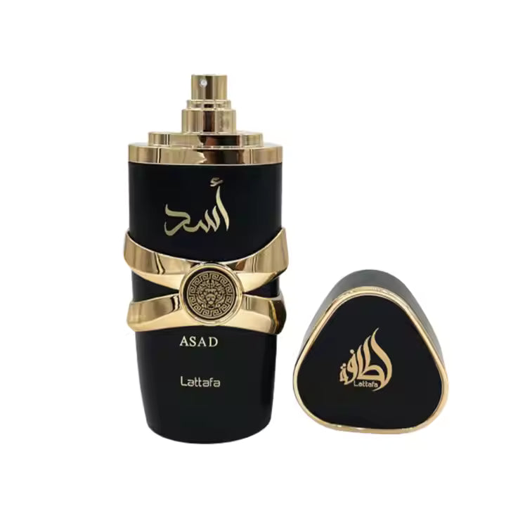 Luxury black and gold ASAD perfume bottle with Lattafa branding, elegant design for premium fragrance