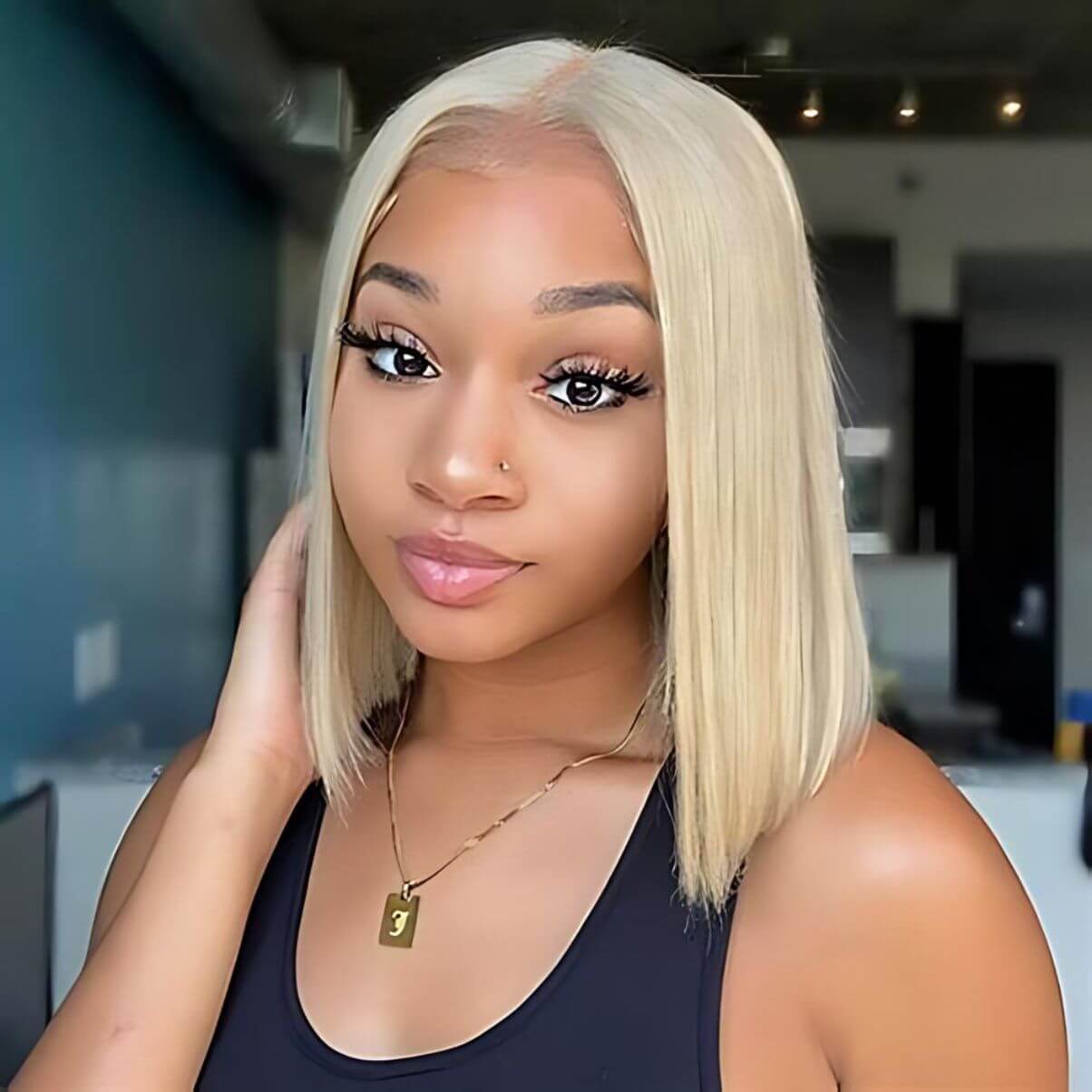 Chic blonde bob wig featuring 180% density and HD lace for a natural look, made from 100% human hair and designed for a flawless, glueless fit.