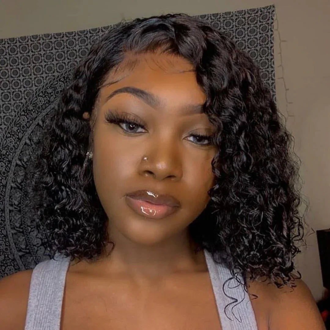 Woman wearing curly human hair wig with natural-looking lace front and voluminous curls