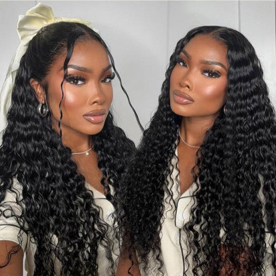 Two women showcasing voluminous curly human hair wigs with natural styling and deep waves