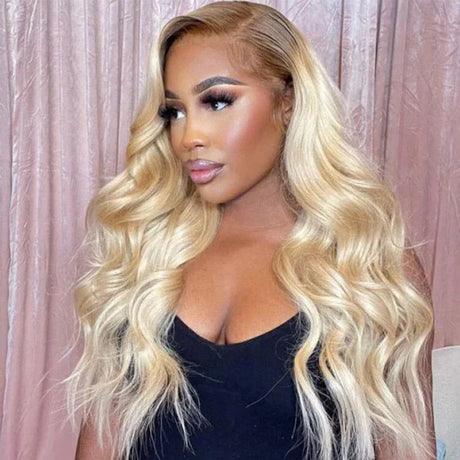 Blonde human hair wig with voluminous body waves, natural-looking lace front, perfect for everyday styling